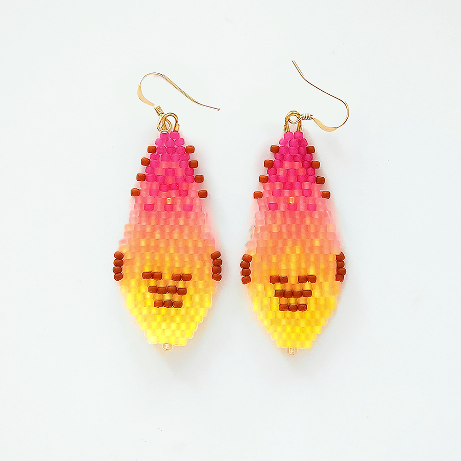 Pair of beaded earrings with pink, orange, and yellow gradient on a white background