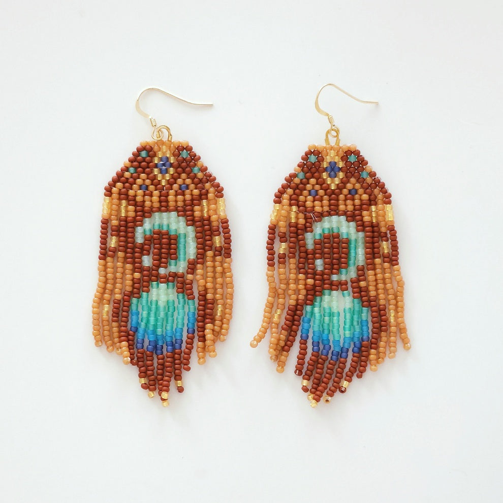 Beaded earrings with brown and blue design on a white background